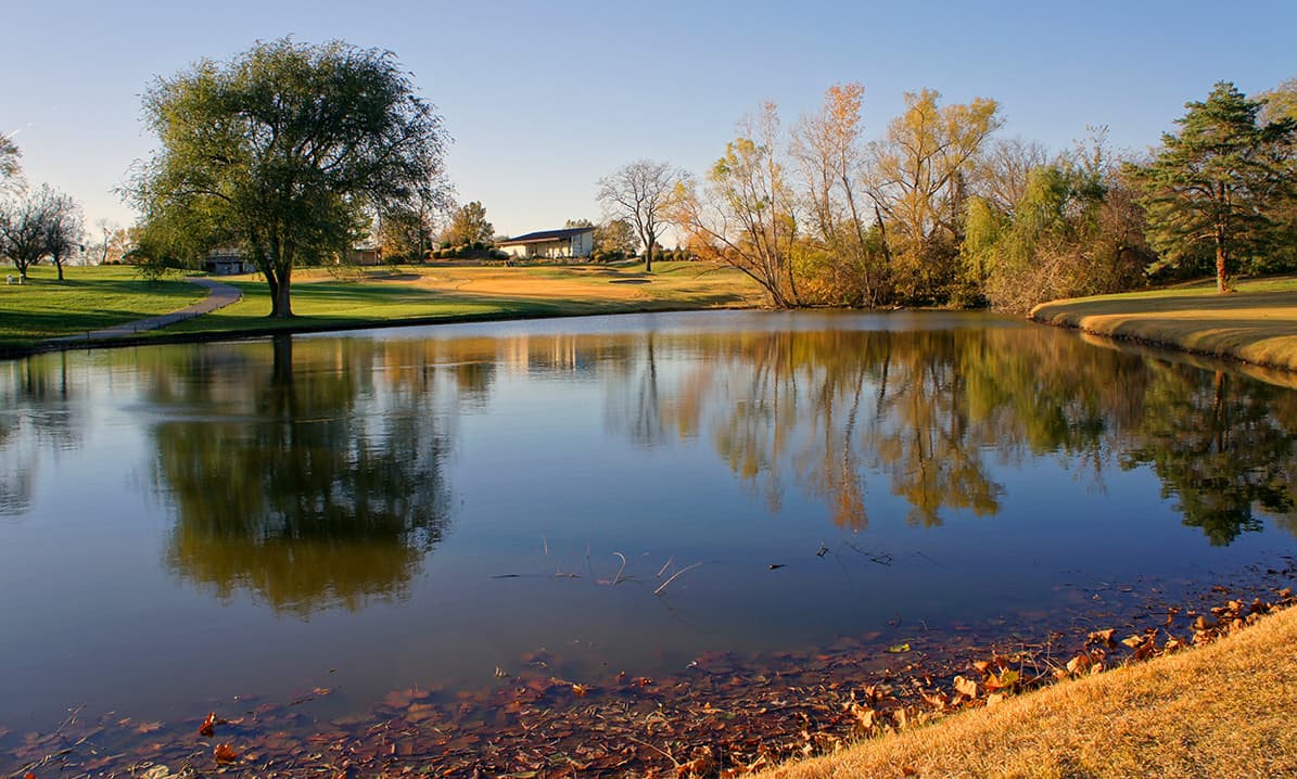 Pond and golf course fairway in autumn at Alvamar in west Lawrence, Kansas